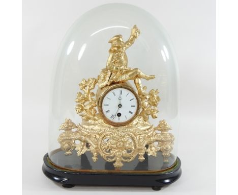 A 19th century gilt spelter mantel clock, contained under a glass dome, 40cm high