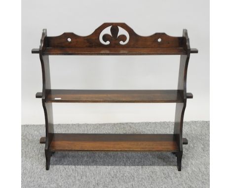 An early 20th century mahogany wall shelf, of small proportions, 58cm