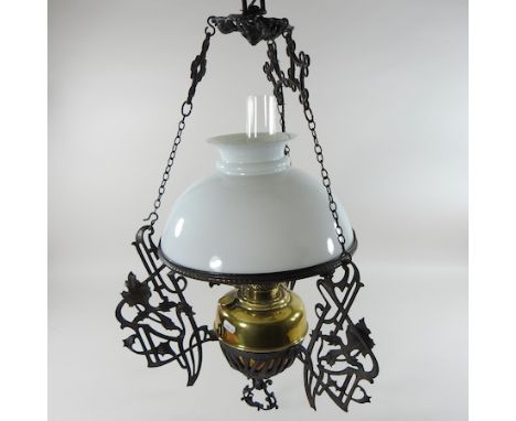 A Victorian brass oil lamp, with an etched glass shade, manufactured by Palmer and Co, 55cm high 