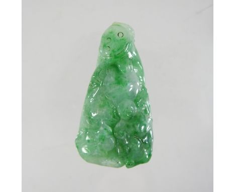 A jade coloured carving, 7cm high
