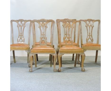 A set of six Chippendale style dining chairs, with leather seats