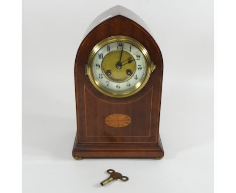 An Edwardian mahogany and inlaid lancet mantel clock, 29cm high