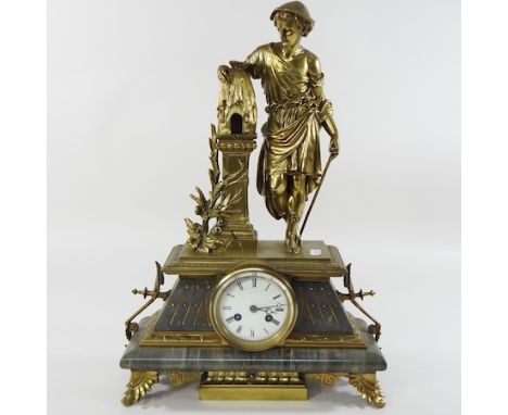 A 19th century continental brass and marble cased figural mantel clock, 45cm high