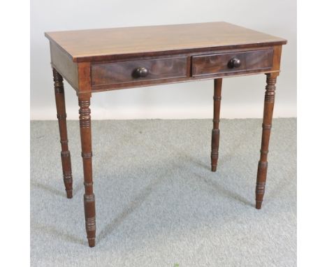 A Regency mahogany side table, on ring turned legs, 84cm