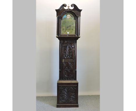 A 19th century and later carved oak 8 day longcase clock, the brass dial with moon phase, above pierced brass spandrels, sign