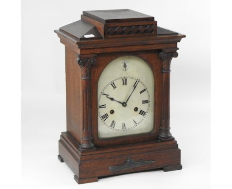 An early 20th century oak cased bracket clock, striking on gongs, 42cm high
