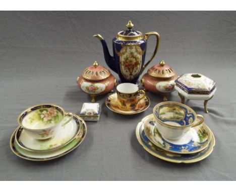 Noritake porcelain to include two trios, coffee can and saucer, coffee pot and cover, pair of circular lidded trinket boxes a