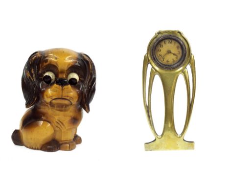 Vintage novelty carved wooden timepiece in the form of a seated dog, with moving eyes, 6" high; together with an Arts & Craft