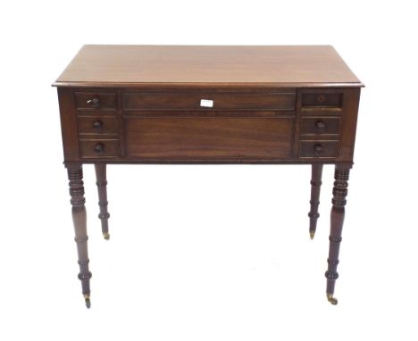 19th century mahogany wash stand the hinged top enclosing interior with five circular wells for a basin soap etc, fitted with