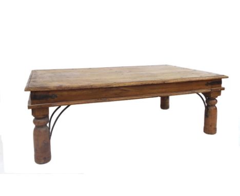 Modern teak coffee table in the Eastern manner applied with iron banding and bracket, 16" high x 47" long and 29.5" deep