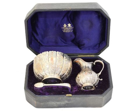 A Victorian silver jug, bowl and tongs, retailed and within a fitted case by F.B Thomas &amp; Company, Bond Street, gross wei