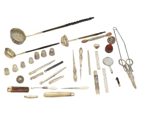 A selection of silver and white metal items, sewing interest, to include thimbles, mother of pearl handled fruit knives, pin 