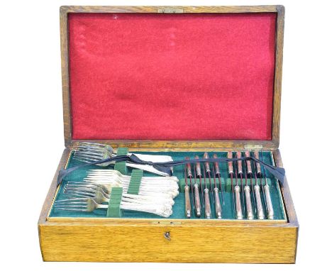 An Elizabeth II silver canteen, comprising 58 pieces to include 8 dinner forks, 8 dessert forks, 2 serving spoons, 8 dessert 