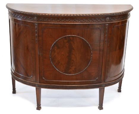 Edwardian mahogany Adam design demi-lune side cabinet, the 'D' shaped top with gradooned molding, blind fretwork frieze, thre