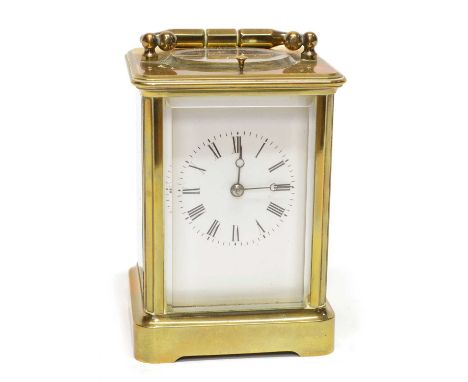20th-century carriage clock, 8-day movement, white enamel dial with Roman numerals, repeater button, brass case, folding hand
