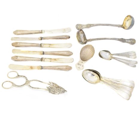 A large selection of silver flatware, to include tablespoons, silver handled knives, tongs, etc, gross weight of solid silver