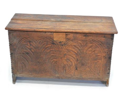 17th-century oak coffer, replacement two plank lid with later hinges, front panel with carved decoration, patch where origina