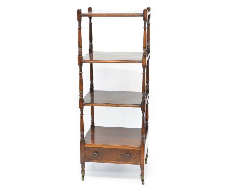 Early 19th-century mahogany four-tier whatnot, the rectangular shelves supported on ring-turned columns, lower shelf with sin