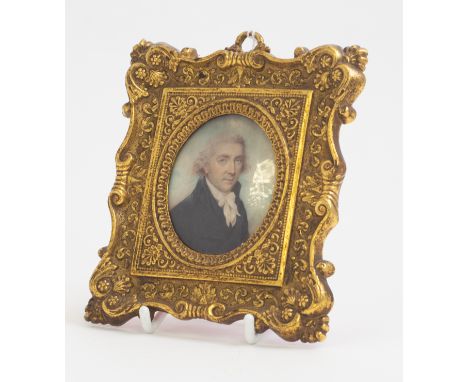 Henry Burch (British, 1763-1834), an oval portrait miniature of a gentleman, wearing a dark blue jacket, 6cm by 5cm, in a lat