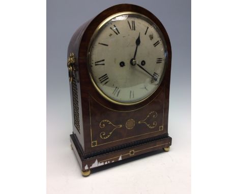 A Regency mahogany bracket clock, circa 1820, the case inlaid with brass, white enamel Roman dial, side handles and sound gri