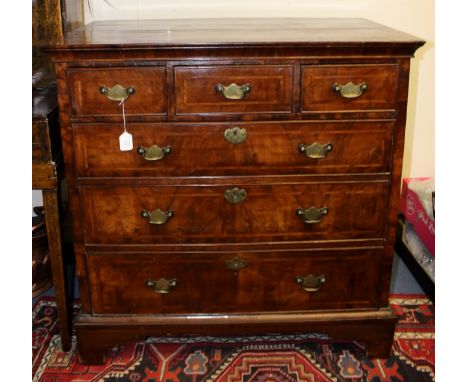 A George I walnut chest of drawers, with three small drawers to top over three long graduated drawers below, bracket feet, 96