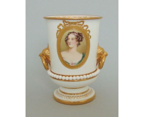 A Royal Worcester urn, white ground with gilt rims and borders and gild birds head ring handles, painted with a portrait of  