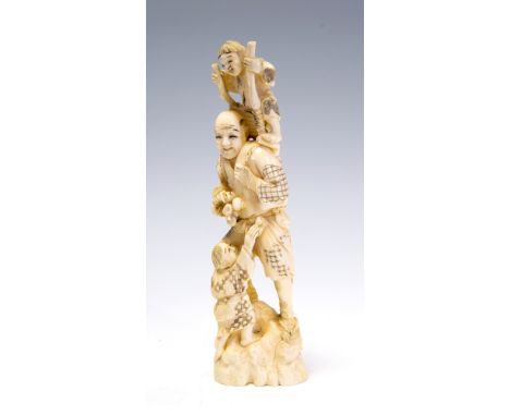 A Japanese ivory tusk carving okimono of a farmer with two infants, Meiji perido, 1868-1912, height 22cmProvenance: Lot 349, 