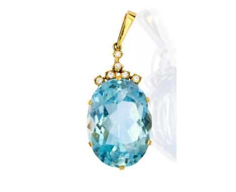 A blue topaz single stone and diamond set 18ct yellow gold pendant, the oval blue topaz approx 28mm x 20mm, six claw set to o