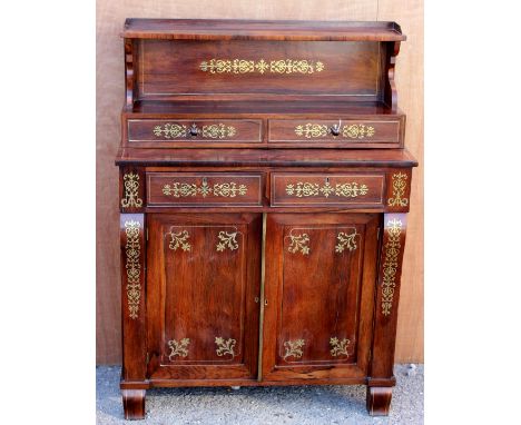 An early 19th Century Regency period rosewood and brass inlaid chiffonier, the upper section with a raised shelf, two small d