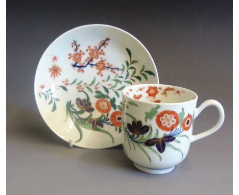 A  Worcester Dr Wall coffee cup and saucer, painted with the Kempthorne pattern, circa 1768-70, blue frett mark, cup 7cm diam