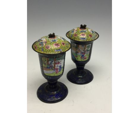 A pair of Chinese Peking enamel covered goblets, late 19th Century, height 20cm (2)
