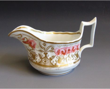 A Newhall 'Old English' shaped cream jug, decorated with pink roses and gilding, pattern No.2901, circa 1825-30, 16.5cm wide,