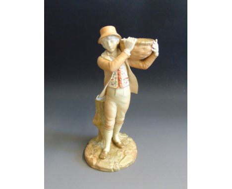 A Royal Worcester figure of a boy carrying a basket on his shoulder standing by a tree trunk spill, circa 1893, shot enamel m
