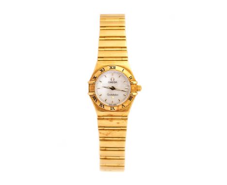 Omega, a lady's 18ct gold Omega Constellation wristwatch, 2cm circular mother of pearl dial with baton numerals, the outer be