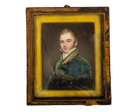 A mid 19th Century portrait miniature on ivory, a young gentleman, half length, wearing a white stock and blue tunic, 10cm by