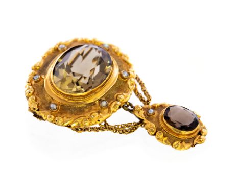 A Victorian yellow gold Cairngorm and smokey quartz set drop brooch, central oval Cairngorm approx 25mm x 19mm, the oval smok