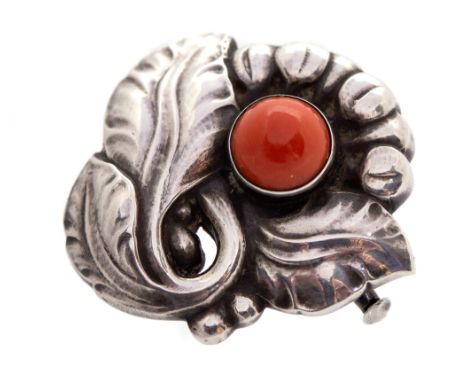Georg Jensen, a Danish Modernist silver and coral brooch, of foliate design set with a coral cabochon, number 71, approx 3.5c