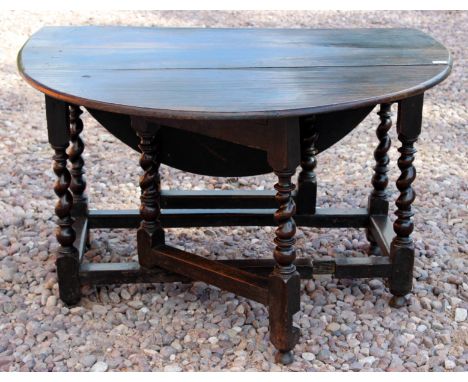 A good Charles II circa 1680 'six seat' Barley twist turned oak gate leg table of good condition, colour and patina (the leav