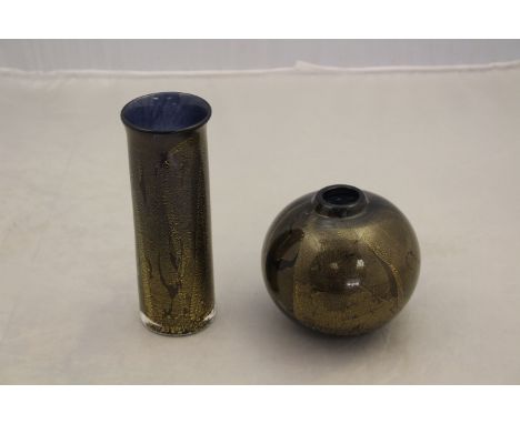 An Isle of Wight Studio Glass 'Gold on Black' range cylinder vase and matching globe vase. (2)                               