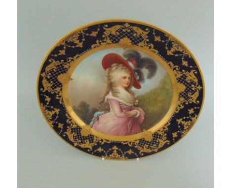 A Vienna cabinet plate with a portrait of Mdme Devonshire,  cobalt blue ground border with elaborate gilding, signed Wagner, 