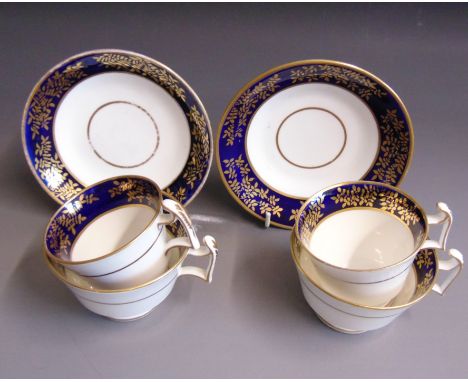 Two Spode London shaped  trios, tea cups  coffee cups and saucers, decorated with cobalt blue and gilt borders, pattern No.27