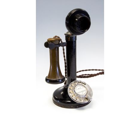 A GPO candelstick telephone Type. No.150, 1920's, black bakelite mouthpiece, rotary dial, braided flex, height 31cm