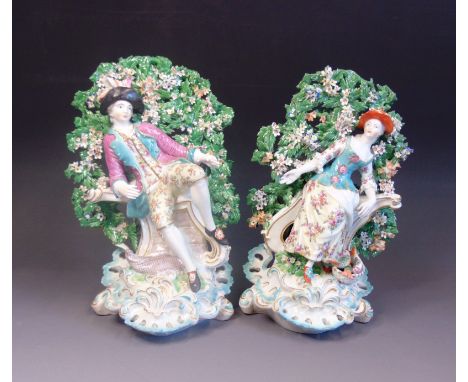 A pair of Derby figures of fisherman and woman, circa 1765,                      patch marks, 25cm high (2)Condition: lady: r