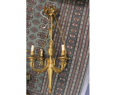 An early 20th Century French ormolu four light electrolier, of Neo-classical design, drop approximately 90cm