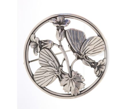 Arno Malinowski for Georg Jensen, Moonlight Blossom, a Danish Modernist silver brooch, number 283, pierced design with butter