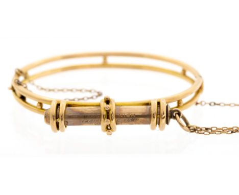 A 15ct gold bangle, by Sampson Morden, inscribed 'Machrihanish Ladies Golf Club 15 April 1904', with an affixed propelling pe