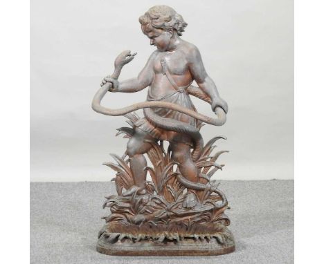 A Victorian style cast iron stick stand, in the form of a boy with a serpent, 85cm high