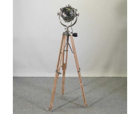 A modern floor standing spotlight lamp