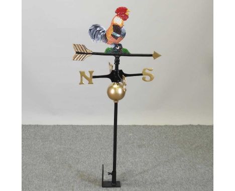 A metal cockerel weather vane109cm high