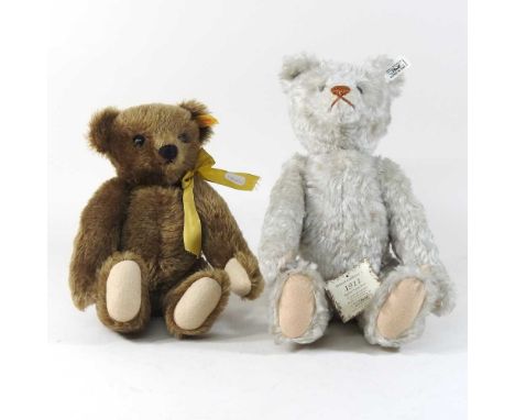A white Steiff teddy bear, 37cm high, together with a brown Steiff bear